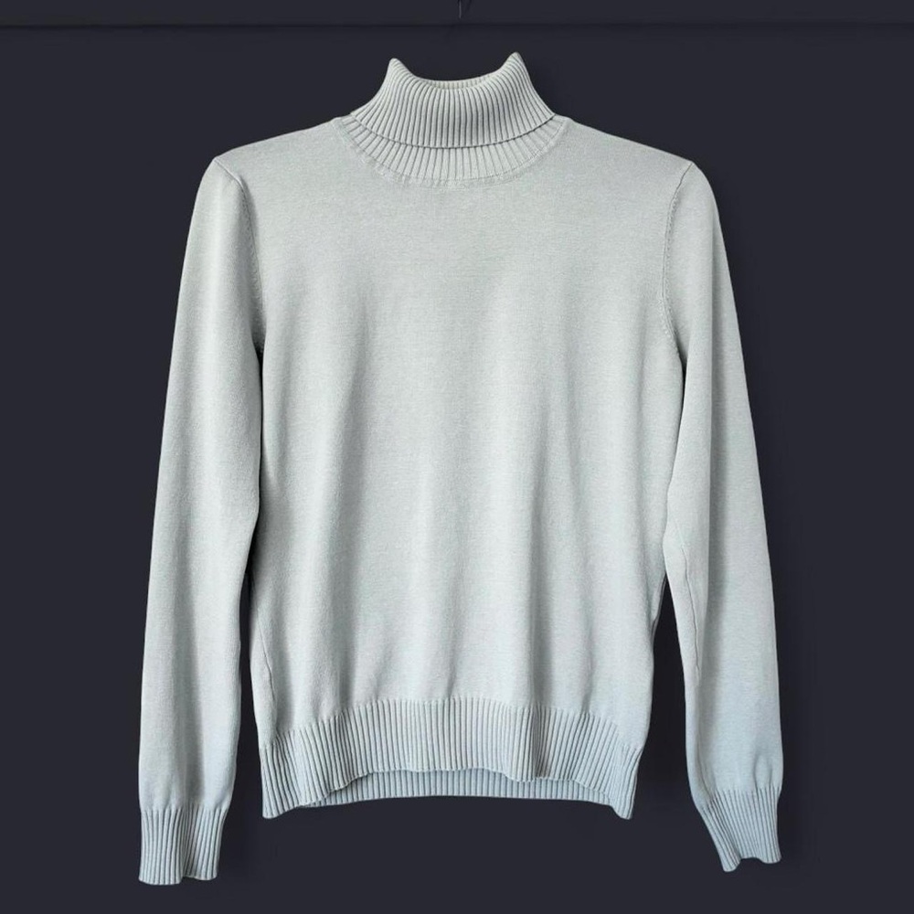 Chadwick’s pale minty blue turtleneck sweater
